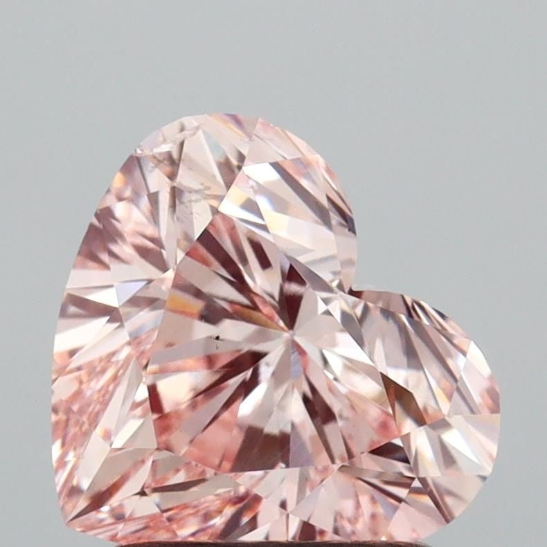 Loose Diamond - HEART 1.7ct Fancy Intense Pink SI1: Loose Diamond - HEART 1.7ct Fancy Intense Pink SI1 Source: This is a real non-mined Diamond that has been grown in a lab Shape: HEART Carats: 1.7 Color: Fancy Intense Pink Certification: IGI Video: