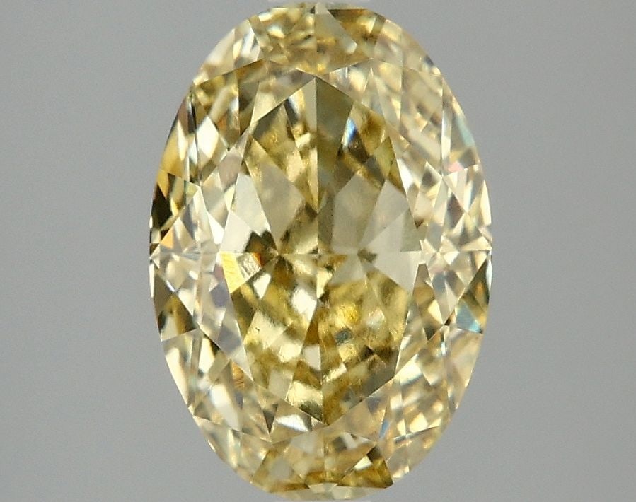 Loose Diamond - OVAL 3.05ct Fancy Vivid Yellow VS1: Loose Diamond - OVAL 3.05ct Fancy Vivid Yellow VS1 Source: This is a real non-mined Diamond that has been grown in a lab Shape: OVAL Carats: 3.05 Color: Fancy Vivid Yellow Certification: IGI Video: