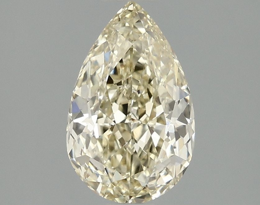 Loose Diamond - PEAR 1.55ct Fancy Yellow VS1: Loose Diamond - PEAR 1.55ct Fancy Yellow VS1 Source: This is a real non-mined Diamond that has been grown in a lab Shape: PEAR Carats: 1.55 Color: Fancy Yellow Certification: IGI Video: