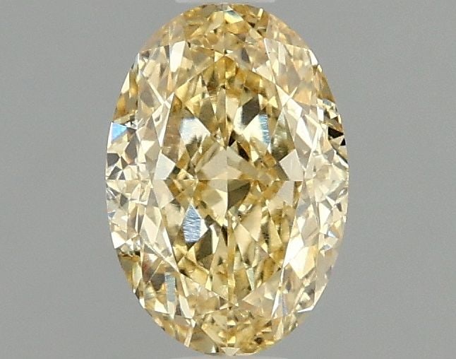 Loose Diamond - OVAL 1.09ct Fancy Intense Yellow VS1: Loose Diamond - OVAL 1.09ct Fancy Intense Yellow VS1 Source: This is a real non-mined Diamond that has been grown in a lab Shape: OVAL Carats: 1.09 Color: Fancy Intense Yellow Certification: IGI Video