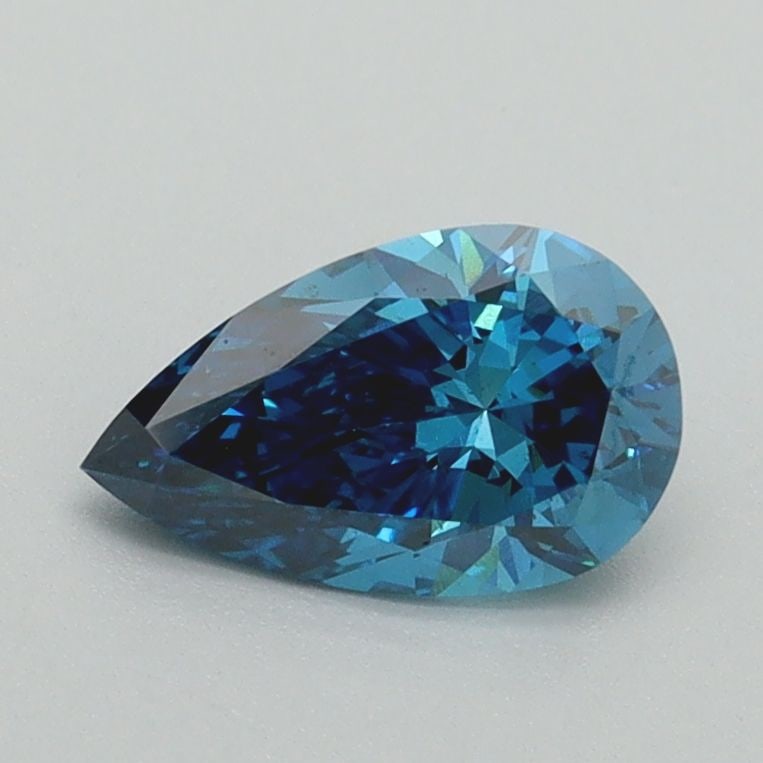 Loose Diamond - PEAR 0.76ct Fancy Vivid Blue VS2: Loose Diamond - PEAR 0.76ct Fancy Vivid Blue VS2 Source: This is a real non-mined Diamond that has been grown in a lab Shape: PEAR Carats: 0.76 Color: Fancy Vivid Blue Certification: IGI Video: