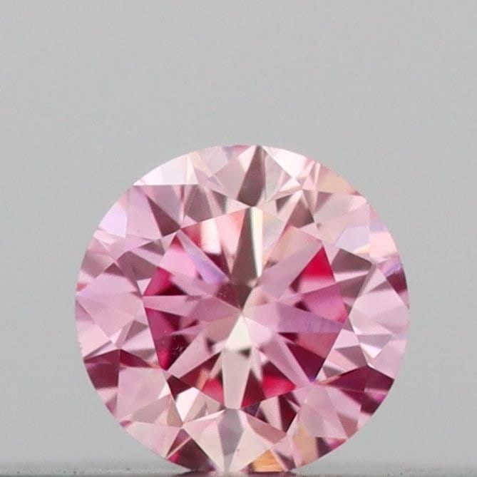 Loose Diamond - ROUND 0.11ct Fancy Intense Pink VS1: Loose Diamond - ROUND 0.11ct Fancy Intense Pink VS1 Source: This is a real non-mined Diamond that has been grown in a lab Shape: ROUND Carats: 0.11 Color: Fancy Intense Pink Certification: IGI Video: