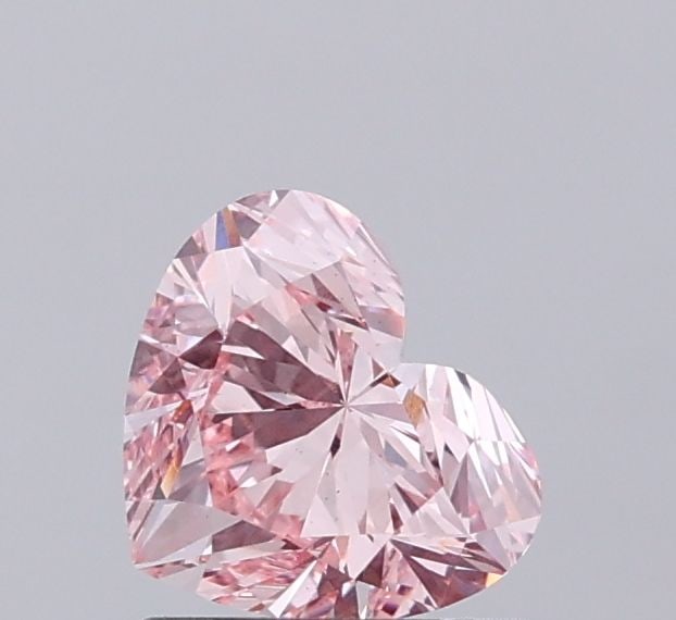 Loose Diamond - HEART 1.0ct Fancy Vivid Pink VS1: Loose Diamond - HEART 1.0ct Fancy Vivid Pink VS1 Source: This is a real non-mined Diamond that has been grown in a lab Shape: HEART Carats: 1.0 Color: Fancy Vivid Pink Certification: IGI Video: