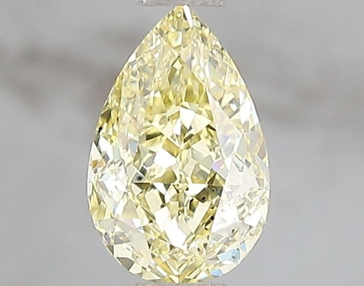 Loose Diamond - PEAR 1.0ct Fancy Intense Yellow SI1: Loose Diamond - PEAR 1.0ct Fancy Intense Yellow SI1 Source: This is a real non-mined Diamond that has been grown in a lab Shape: PEAR Carats: 1.0 Color: Fancy Intense Yellow Certification: IGI Additio