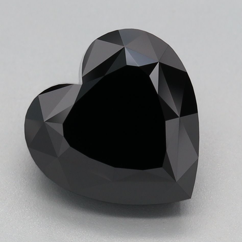 Loose Diamond - HEART 3.05ct Fancy Black: Loose Diamond - HEART 3.05ct Fancy Black Source: This is a real non-mined Diamond that has been grown in a lab Shape: HEART Carats: 3.05 Color: Fancy Black Certification: IGI Video: