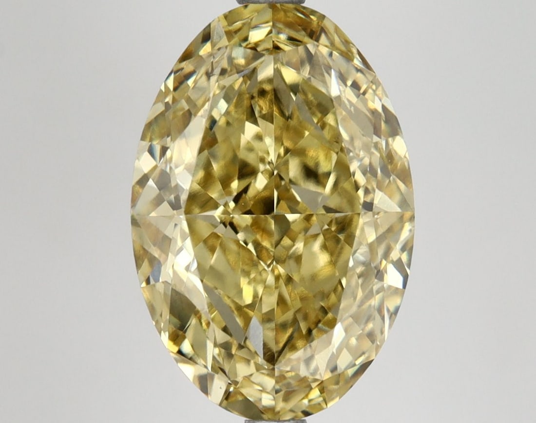 Loose Diamond - OVAL 6.14ct Fancy Vivid Yellow VS2: Loose Diamond - OVAL 6.14ct Fancy Vivid Yellow VS2 Source: This is a real non-mined Diamond that has been grown in a lab Shape: OVAL Carats: 6.14 Color: Fancy Vivid Yellow Certification: IGI Video:
