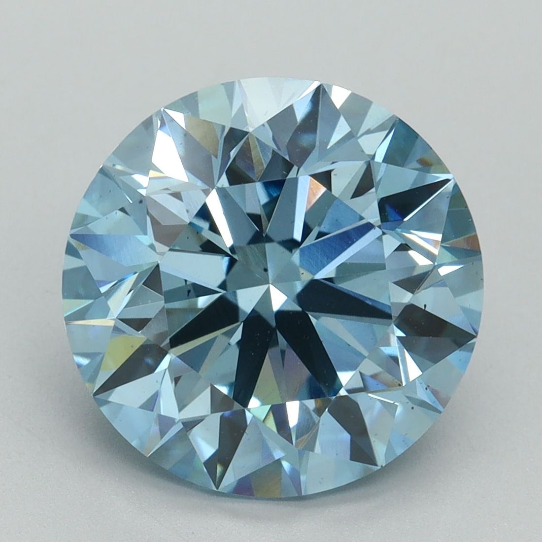 Loose Diamond - ROUND 6.01ct Fancy Vivid Blue VS2: Loose Diamond - ROUND 6.01ct Fancy Vivid Blue VS2 Source: This is a real non-mined Diamond that has been grown in a lab Shape: ROUND Carats: 6.01 Color: Fancy Vivid Blue Certification: IGI Video: