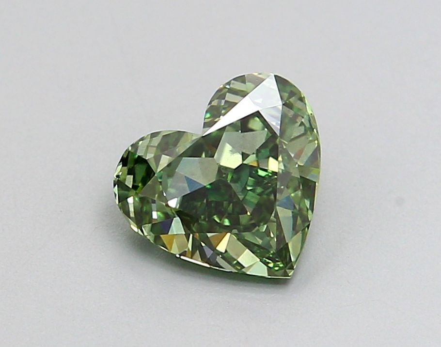 Loose Diamond - HEART 0.82ct Fancy Vivid Green VS2: Loose Diamond - HEART 0.82ct Fancy Vivid Green VS2 Source: This is a real non-mined Diamond that has been grown in a lab Shape: HEART Carats: 0.82 Color: Fancy Vivid Green Certification: IGI Video: