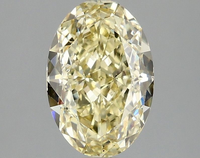 Loose Diamond - OVAL 2.1ct Fancy Intense Yellow VS1: Loose Diamond - OVAL 2.1ct Fancy Intense Yellow VS1 Source: This is a real non-mined Diamond that has been grown in a lab Shape: OVAL Carats: 2.1 Color: Fancy Intense Yellow Certification: IGI Video: