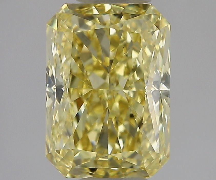 Loose Diamond - RADIANT 1.31ct Fancy Vivid Yellow VS1: Loose Diamond - RADIANT 1.31ct Fancy Vivid Yellow VS1 Source: This is a real non-mined Diamond that has been grown in a lab Shape: RADIANT Carats: 1.31 Color: Fancy Vivid Yellow Certification: IGI Vid