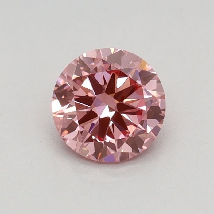 Loose Diamond - ROUND 0.41ct Fancy Vivid Pink VS1: Loose Diamond - ROUND 0.41ct Fancy Vivid Pink VS1 Source: This is a real non-mined Diamond that has been grown in a lab Shape: ROUND Carats: 0.41 Color: Fancy Vivid Pink Certification: IGI Video: