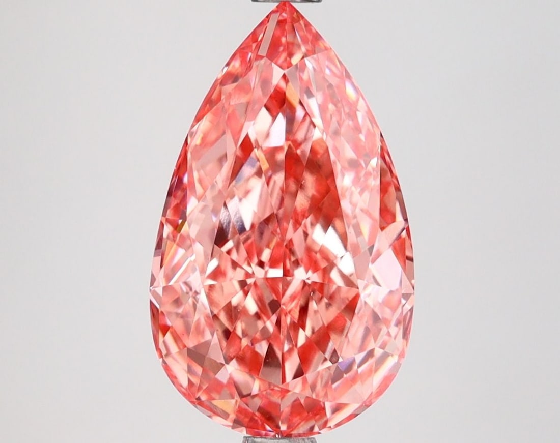 Loose Diamond - PEAR 3.03ct Fancy Vivid Pink VS1: Loose Diamond - PEAR 3.03ct Fancy Vivid Pink VS1 Source: This is a real non-mined Diamond that has been grown in a lab Shape: PEAR Carats: 3.03 Color: Fancy Vivid Pink Certification: IGI Video: Video