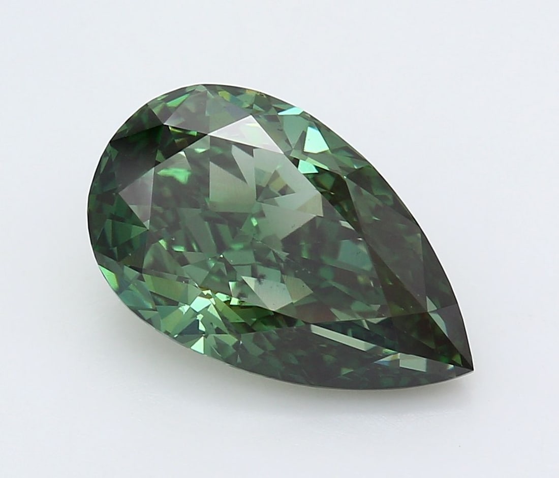 Loose Diamond - PEAR 4.78ct Fancy Vivid Green VS1: Loose Diamond - PEAR 4.78ct Fancy Vivid Green VS1 Source: This is a real non-mined Diamond that has been grown in a lab Shape: PEAR Carats: 4.78 Color: Fancy Vivid Green Certification: IGI Video: