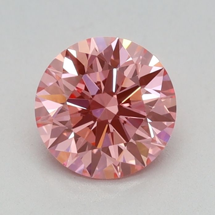 Ideal Loose Diamond - ROUND 0.61ct Fancy Vivid Pink VVS2: Ideal Loose Diamond - ROUND 0.61ct Fancy Vivid Pink VVS2 Source: This is a real non-mined Diamond that has been grown in a lab Shape: ROUND Carats: 0.61 Color: Fancy Vivid Pink Certification: IGI Vide