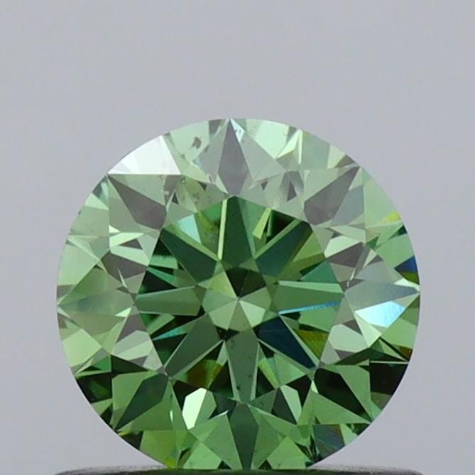 Ideal Loose Diamond - ROUND 0.62ct Fancy Vivid Green VS2: Ideal Loose Diamond - ROUND 0.62ct Fancy Vivid Green VS2 Source: This is a real non-mined Diamond that has been grown in a lab Shape: ROUND Carats: 0.62 Color: Fancy Vivid Green Certification: IGI Vid