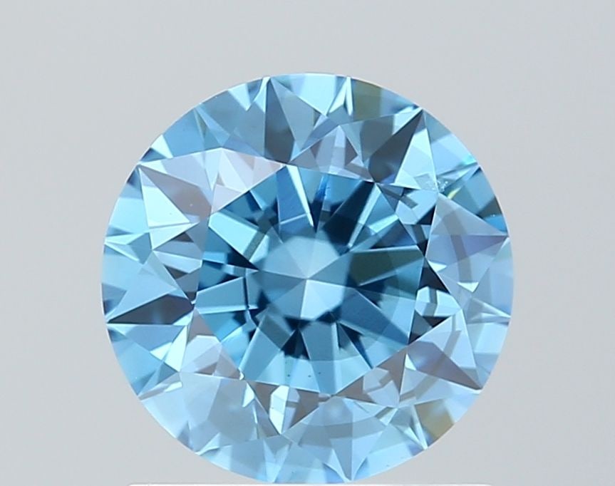 Loose Diamond - ROUND 1.1ct Fancy Vivid Blue SI1: Loose Diamond - ROUND 1.1ct Fancy Vivid Blue SI1 Source: This is a real non-mined Diamond that has been grown in a lab Shape: ROUND Carats: 1.1 Color: Fancy Vivid Blue Certification: IGI Video: