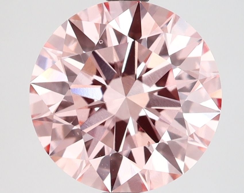 Ideal Loose Diamond - ROUND 2.75ct Fancy Vivid Pink VS2: Ideal Loose Diamond - ROUND 2.75ct Fancy Vivid Pink VS2 Source: This is a real non-mined Diamond that has been grown in a lab Shape: ROUND Carats: 2.75 Color: Fancy Vivid Pink Certification: IGI Video