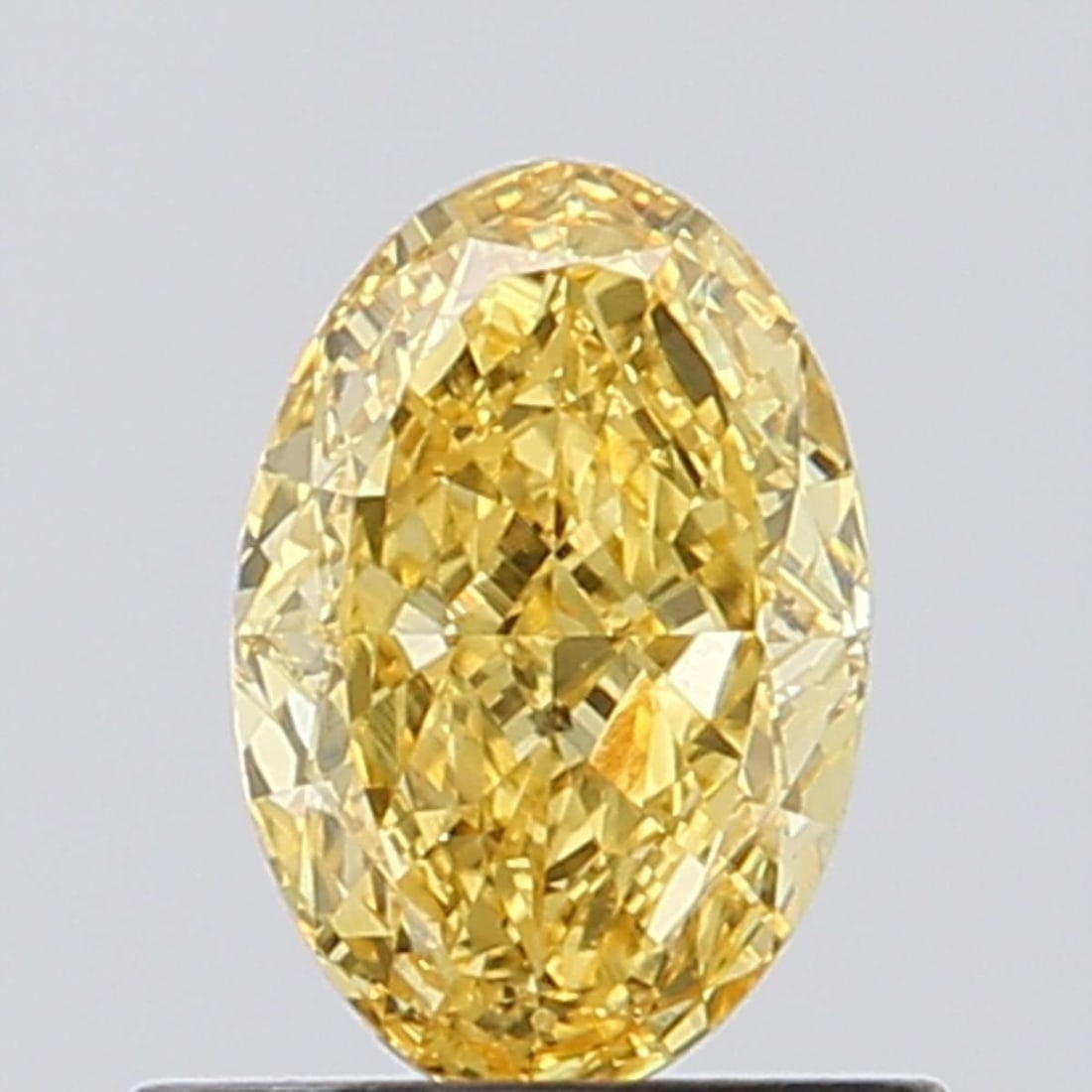 Loose Diamond - OVAL 0.71ct Fancy Vivid Yellow VS2: Loose Diamond - OVAL 0.71ct Fancy Vivid Yellow VS2 Source: This is a real non-mined Diamond that has been grown in a lab Shape: OVAL Carats: 0.71 Color: Fancy Vivid Yellow Certification: NONE Video:
