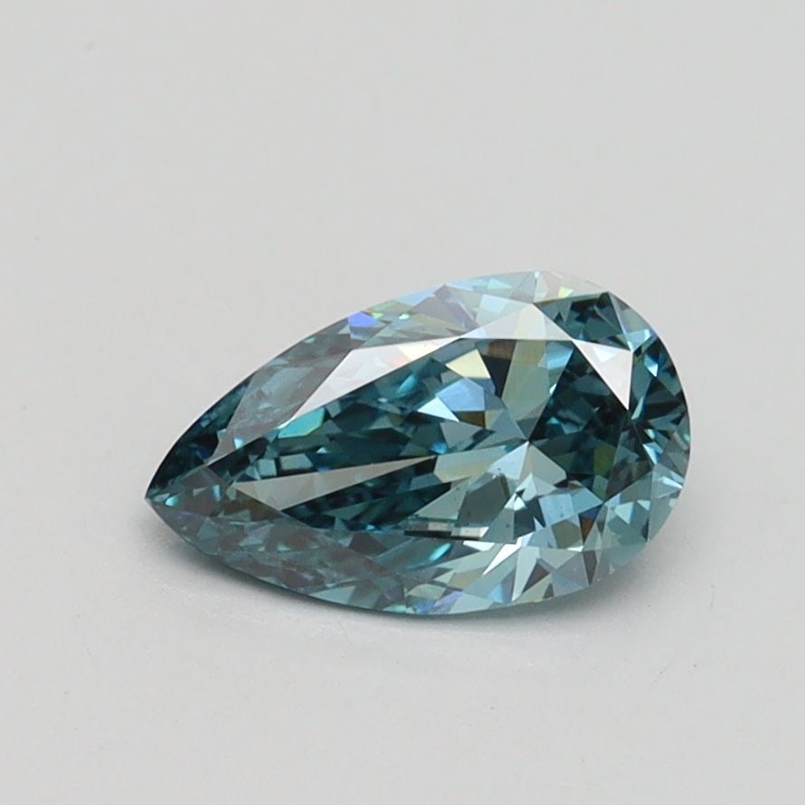 Loose Diamond - PEAR 0.71ct Fancy Vivid Greenish Blue VS1: Loose Diamond - PEAR 0.71ct Fancy Vivid Greenish Blue VS1 Source: This is a real non-mined Diamond that has been grown in a lab Shape: PEAR Carats: 0.71 Color: Fancy Vivid Greenish Blue Certification: