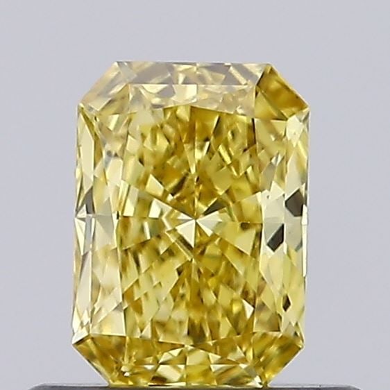 Loose Diamond - RADIANT 0.46ct Fancy Vivid Yellow VS1: Loose Diamond - RADIANT 0.46ct Fancy Vivid Yellow VS1 Source: This is a real non-mined Diamond that has been grown in a lab Shape: RADIANT Carats: 0.46 Color: Fancy Vivid Yellow Certification: IGI Vid