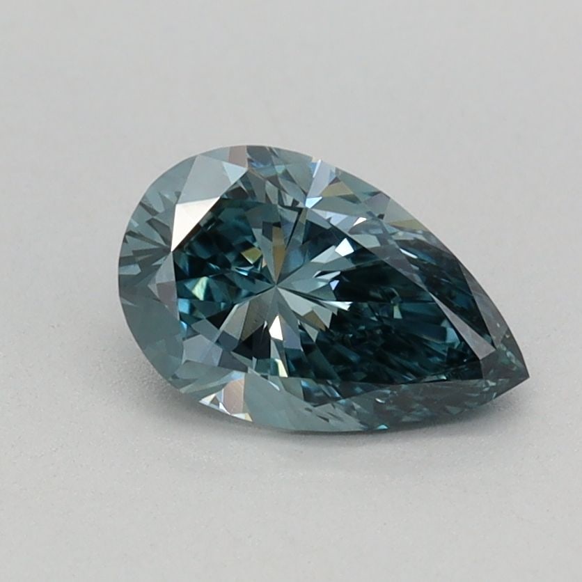 Loose Diamond - PEAR 0.58ct Fancy Vivid Greenish Blue VVS2: Loose Diamond - PEAR 0.58ct Fancy Vivid Greenish Blue VVS2 Source: This is a real non-mined Diamond that has been grown in a lab Shape: PEAR Carats: 0.58 Color: Fancy Vivid Greenish Blue Certification