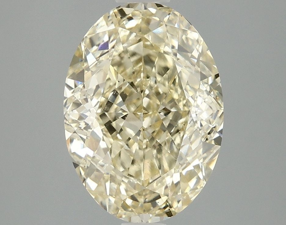 Loose Diamond - OVAL 3.08ct Fancy Light Yellow VS1: Loose Diamond - OVAL 3.08ct Fancy Light Yellow VS1 Source: This is a real non-mined Diamond that has been grown in a lab Shape: OVAL Carats: 3.08 Color: Fancy Light Yellow Certification: IGI Video: