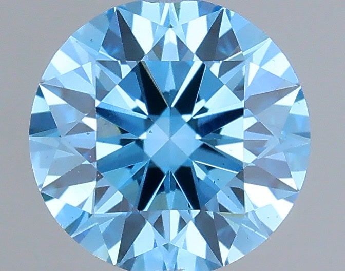 Ideal Loose Diamond - ROUND 0.7ct Fancy Vivid Blue VS2: Ideal Loose Diamond - ROUND 0.7ct Fancy Vivid Blue VS2 Source: This is a real non-mined Diamond that has been grown in a lab Shape: ROUND Carats: 0.7 Color: Fancy Vivid Blue Certification: IGI Video: