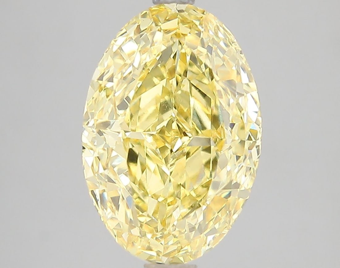 Loose Diamond - OVAL 5.05ct Fancy Vivid Yellow VS2: Loose Diamond - OVAL 5.05ct Fancy Vivid Yellow VS2 Source: This is a real non-mined Diamond that has been grown in a lab Shape: OVAL Carats: 5.05 Color: Fancy Vivid Yellow Certification: IGI Video: