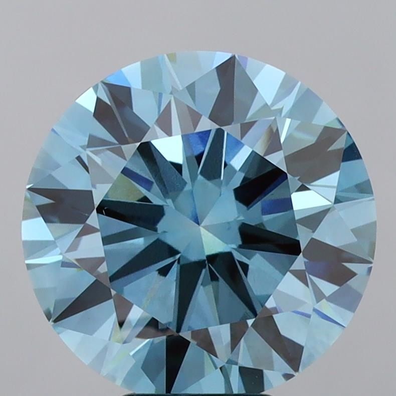 Ideal Loose Diamond - ROUND 7.01ct Fancy Vivid Blue VS1: Ideal Loose Diamond - ROUND 7.01ct Fancy Vivid Blue VS1 Source: This is a real non-mined Diamond that has been grown in a lab Shape: ROUND Carats: 7.01 Color: Fancy Vivid Blue Certification: IGI Video