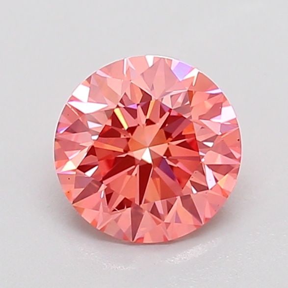 Loose Diamond - ROUND 1.0ct Fancy Vivid Pink VS2: Loose Diamond - ROUND 1.0ct Fancy Vivid Pink VS2 Source: This is a real non-mined Diamond that has been grown in a lab Shape: ROUND Carats: 1.0 Color: Fancy Vivid Pink Certification: IGI Additional im