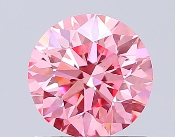 Loose Diamond - ROUND 1.02ct Fancy Vivid Pink VS1: Loose Diamond - ROUND 1.02ct Fancy Vivid Pink VS1 Source: This is a real non-mined Diamond that has been grown in a lab Shape: ROUND Carats: 1.02 Color: Fancy Vivid Pink Certification: IGI Video: