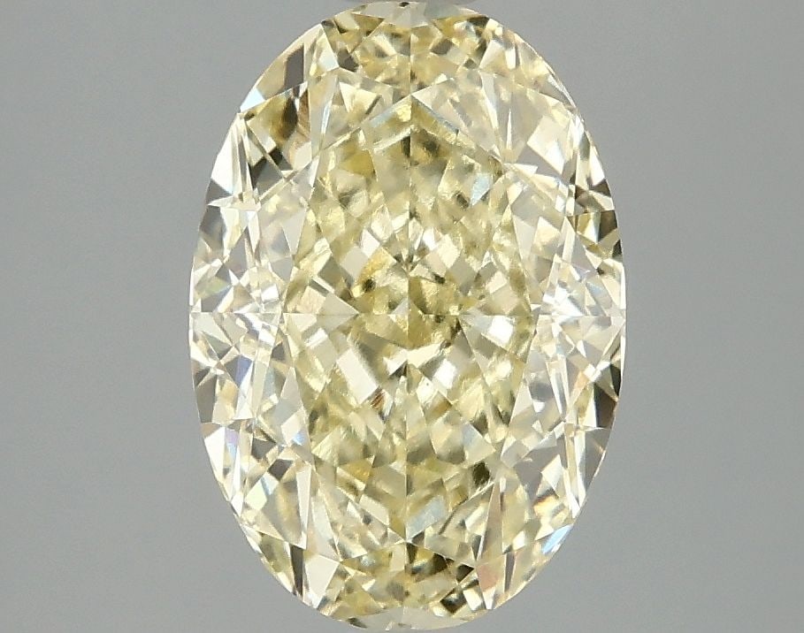 Loose Diamond - OVAL 3.08ct Fancy Vivid Yellow VS1: Loose Diamond - OVAL 3.08ct Fancy Vivid Yellow VS1 Source: This is a real non-mined Diamond that has been grown in a lab Shape: OVAL Carats: 3.08 Color: Fancy Vivid Yellow Certification: IGI Video: