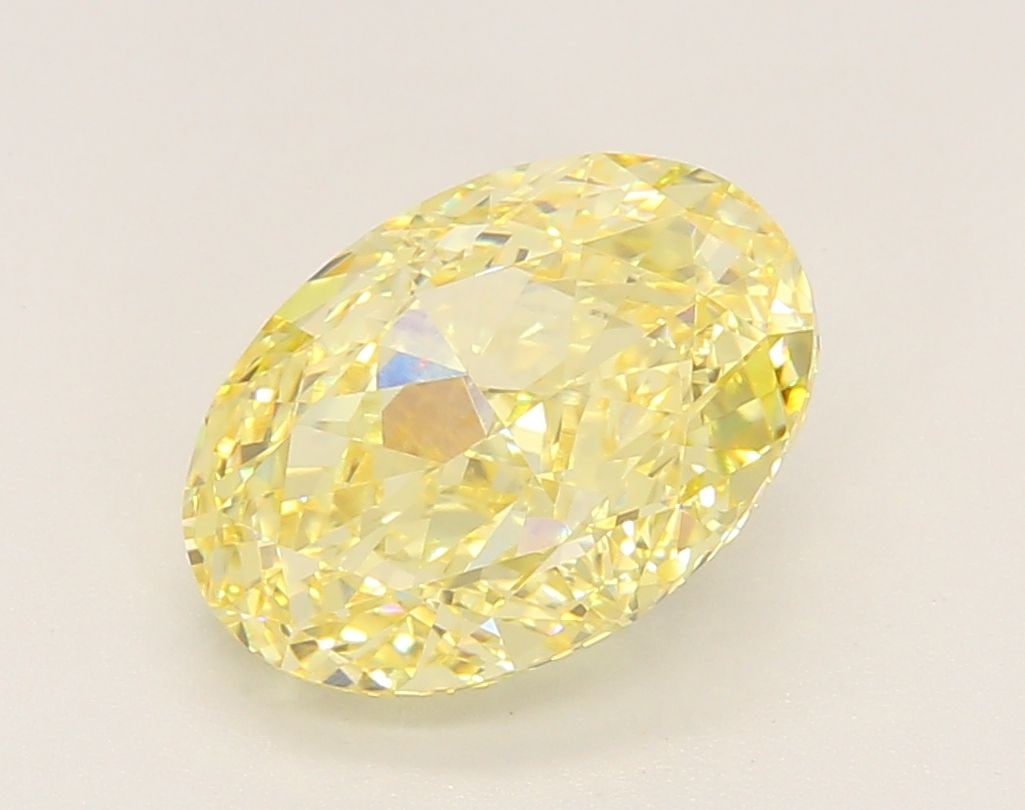 Loose Diamond - OVAL 3.14ct Fancy Yellow VVS2: Loose Diamond - OVAL 3.14ct Fancy Yellow VVS2 Source: This is a real non-mined Diamond that has been grown in a lab Shape: OVAL Carats: 3.14 Color: Fancy Yellow Certification: IGI Video: Video Link