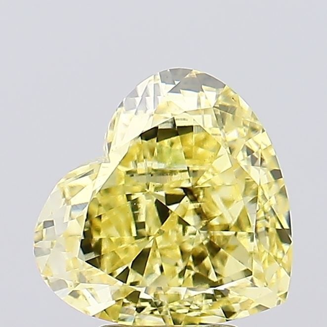 Loose Diamond - HEART 5.01ct Fancy Intense Yellow SI1: Loose Diamond - HEART 5.01ct Fancy Intense Yellow SI1 Source: This is a real non-mined Diamond that has been grown in a lab Shape: HEART Carats: 5.01 Color: Fancy Intense Yellow Certification: IGI Vid