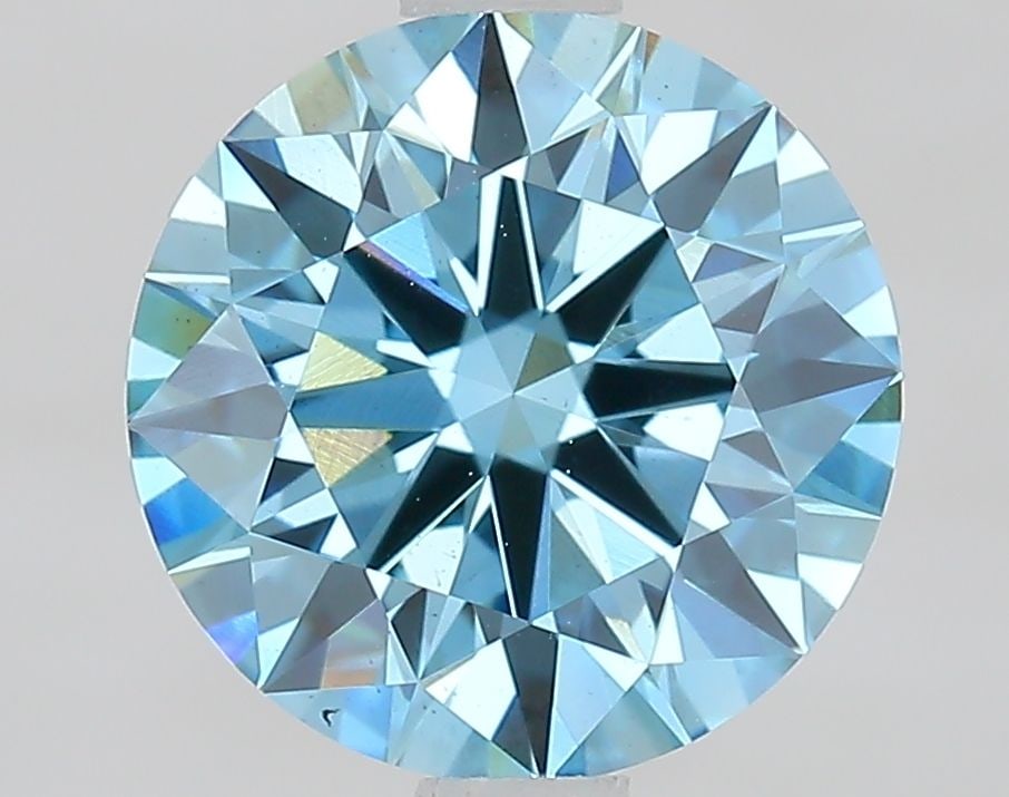 Ideal Loose Diamond - ROUND 1.7ct Fancy Vivid Blue VS1: Ideal Loose Diamond - ROUND 1.7ct Fancy Vivid Blue VS1 Source: This is a real non-mined Diamond that has been grown in a lab Shape: ROUND Carats: 1.7 Color: Fancy Vivid Blue Certification: IGI Video: