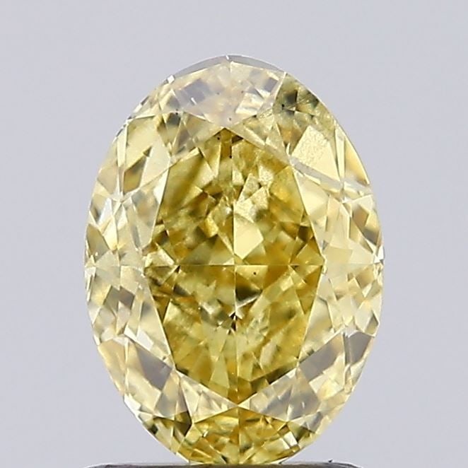 Loose Diamond - OVAL 1.05ct Fancy Intense Yellow SI1: Loose Diamond - OVAL 1.05ct Fancy Intense Yellow SI1 Source: This is a real non-mined Diamond that has been grown in a lab Shape: OVAL Carats: 1.05 Color: Fancy Intense Yellow Certification: IGI Video