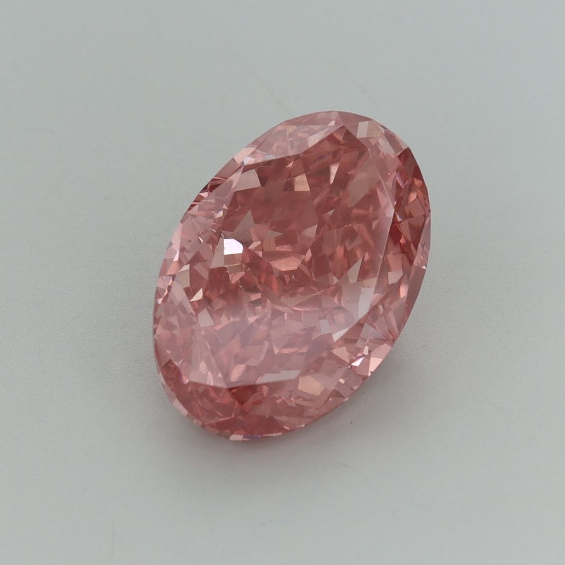 Loose Diamond - OVAL 5.08ct Fancy Vivid Pink VS1: Loose Diamond - OVAL 5.08ct Fancy Vivid Pink VS1 Source: This is a real non-mined Diamond that has been grown in a lab Shape: OVAL Carats: 5.08 Color: Fancy Vivid Pink Certification: IGI Video: