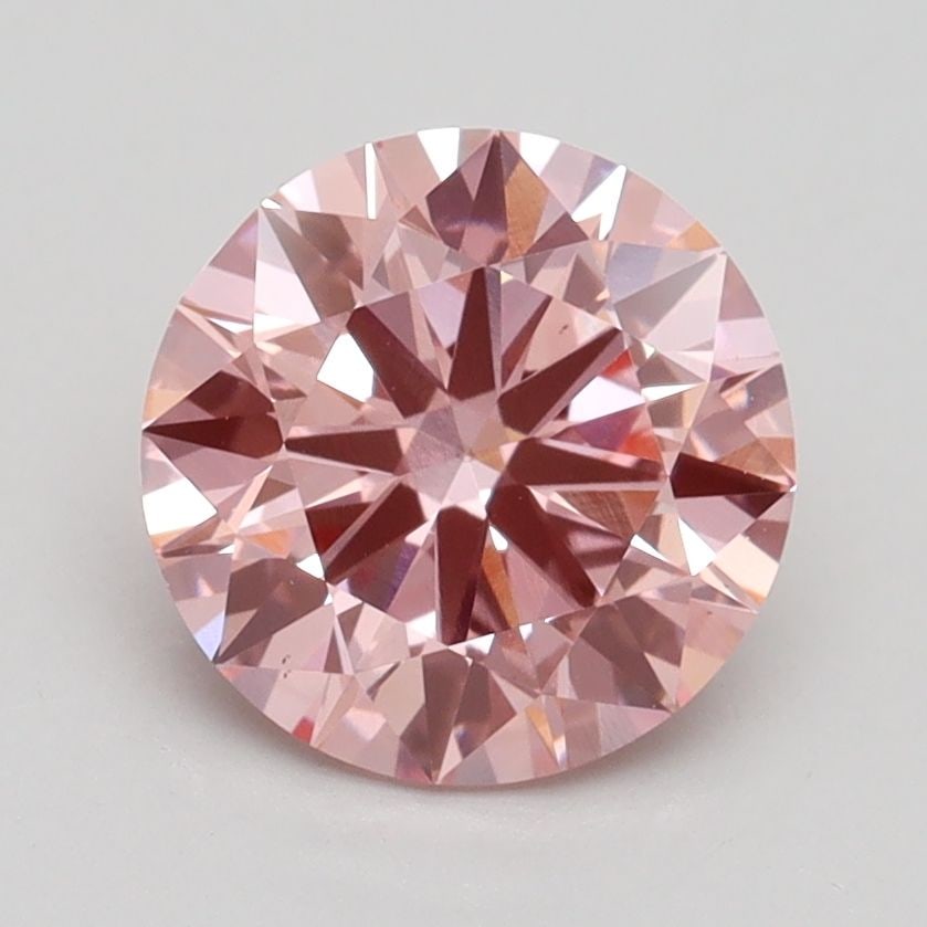 Ideal Loose Diamond - ROUND 1.84ct Fancy Vivid Pink VS1: Ideal Loose Diamond - ROUND 1.84ct Fancy Vivid Pink VS1 Source: This is a real non-mined Diamond that has been grown in a lab Shape: ROUND Carats: 1.84 Color: Fancy Vivid Pink Certification: IGI Video