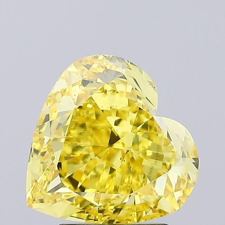 Loose Diamond - HEART 4.04ct Fancy Vivid Yellow VS2: Loose Diamond - HEART 4.04ct Fancy Vivid Yellow VS2 Source: This is a real non-mined Diamond that has been grown in a lab Shape: HEART Carats: 4.04 Color: Fancy Vivid Yellow Certification: IGI Video: