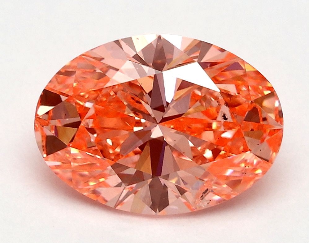 Loose Diamond - OVAL 1.96ct Fancy Vivid Pink SI2: Loose Diamond - OVAL 1.96ct Fancy Vivid Pink SI2 Source: This is a real non-mined Diamond that has been grown in a lab Shape: OVAL Carats: 1.96 Color: Fancy Vivid Pink Certification: IGI Video: