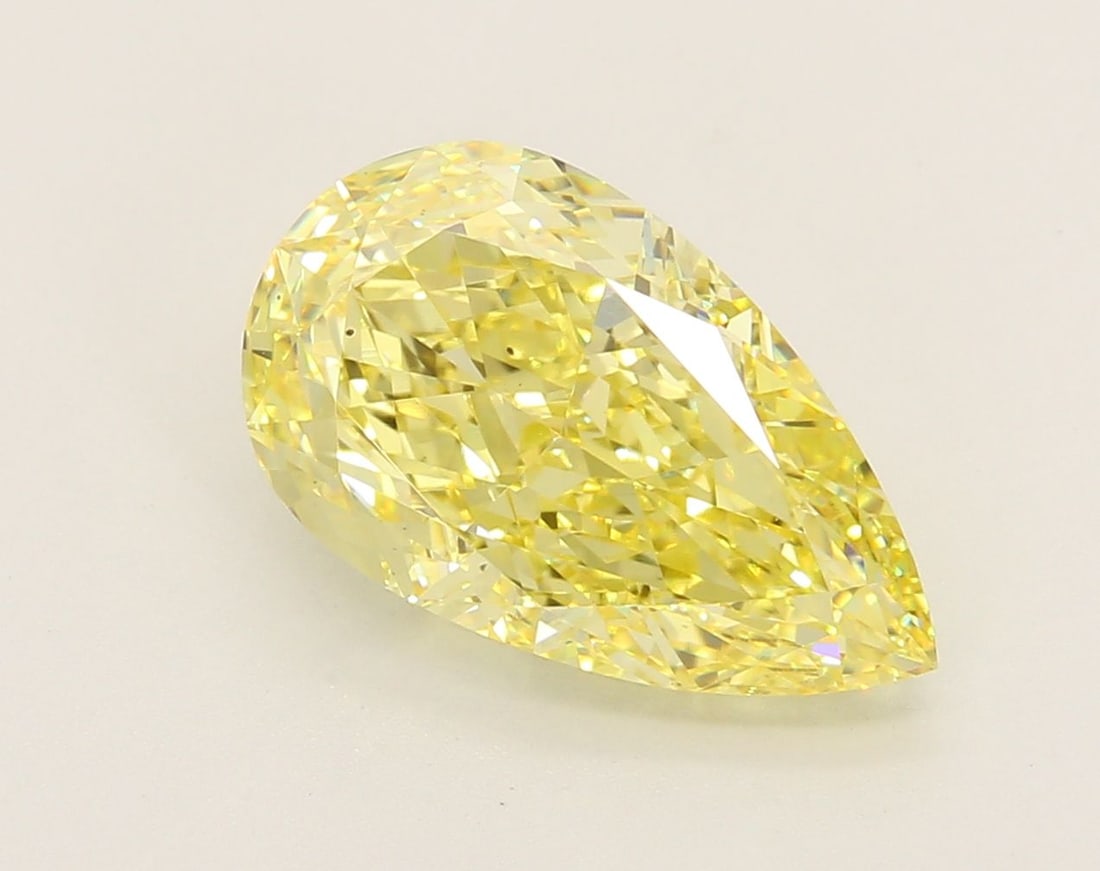 Loose Diamond - PEAR 4.41ct Fancy Vivid Yellow VS2: Loose Diamond - PEAR 4.41ct Fancy Vivid Yellow VS2 Source: This is a real non-mined Diamond that has been grown in a lab Shape: PEAR Carats: 4.41 Color: Fancy Vivid Yellow Certification: IGI Video: