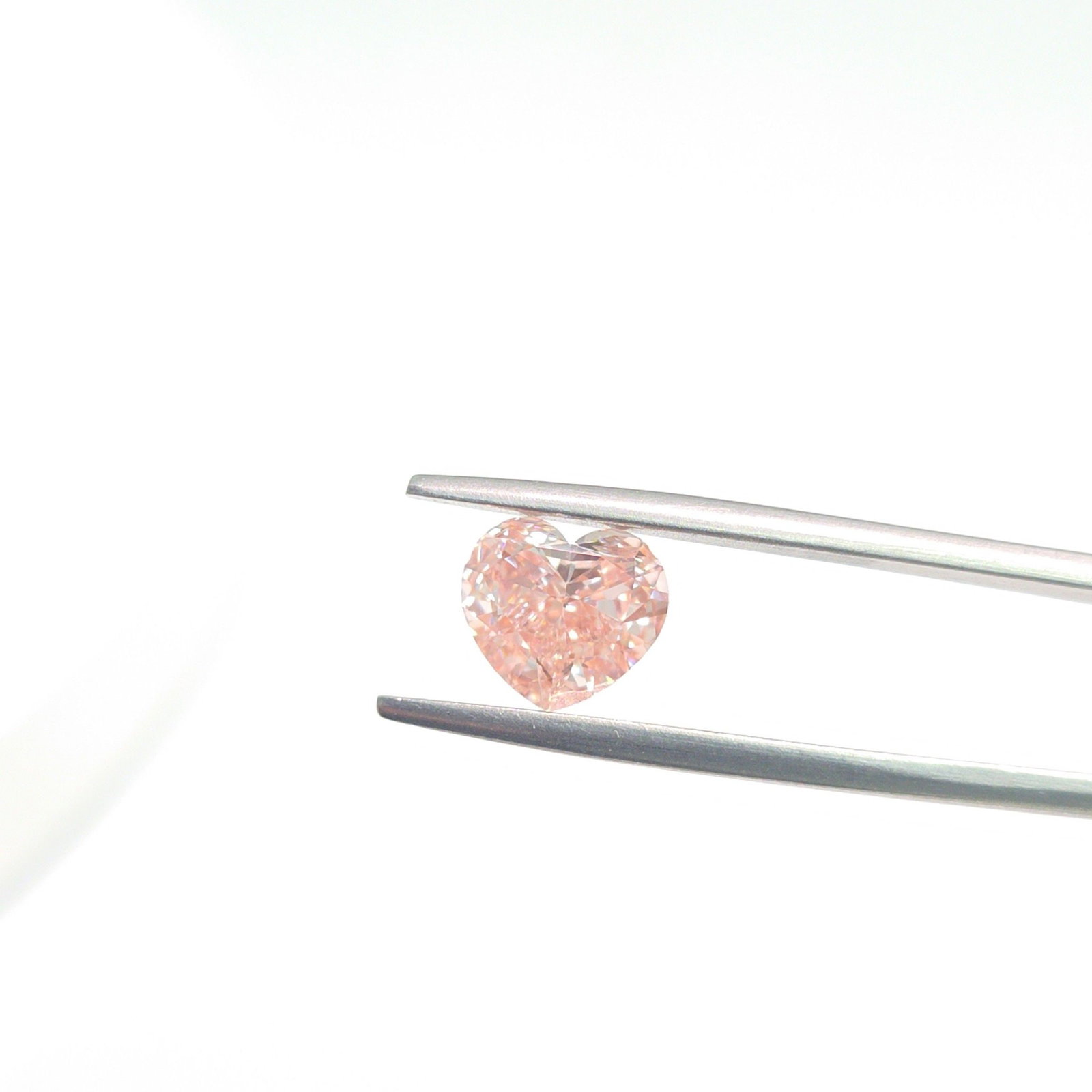 Loose Diamond - HEART 2.06ct Fancy Vivid Pink VVS2: Loose Diamond - HEART 2.06ct Fancy Vivid Pink VVS2 Source: This is a real non-mined Diamond that has been grown in a lab Shape: HEART Carats: 2.06 Color: Fancy Vivid Pink Certification: IGI Additional