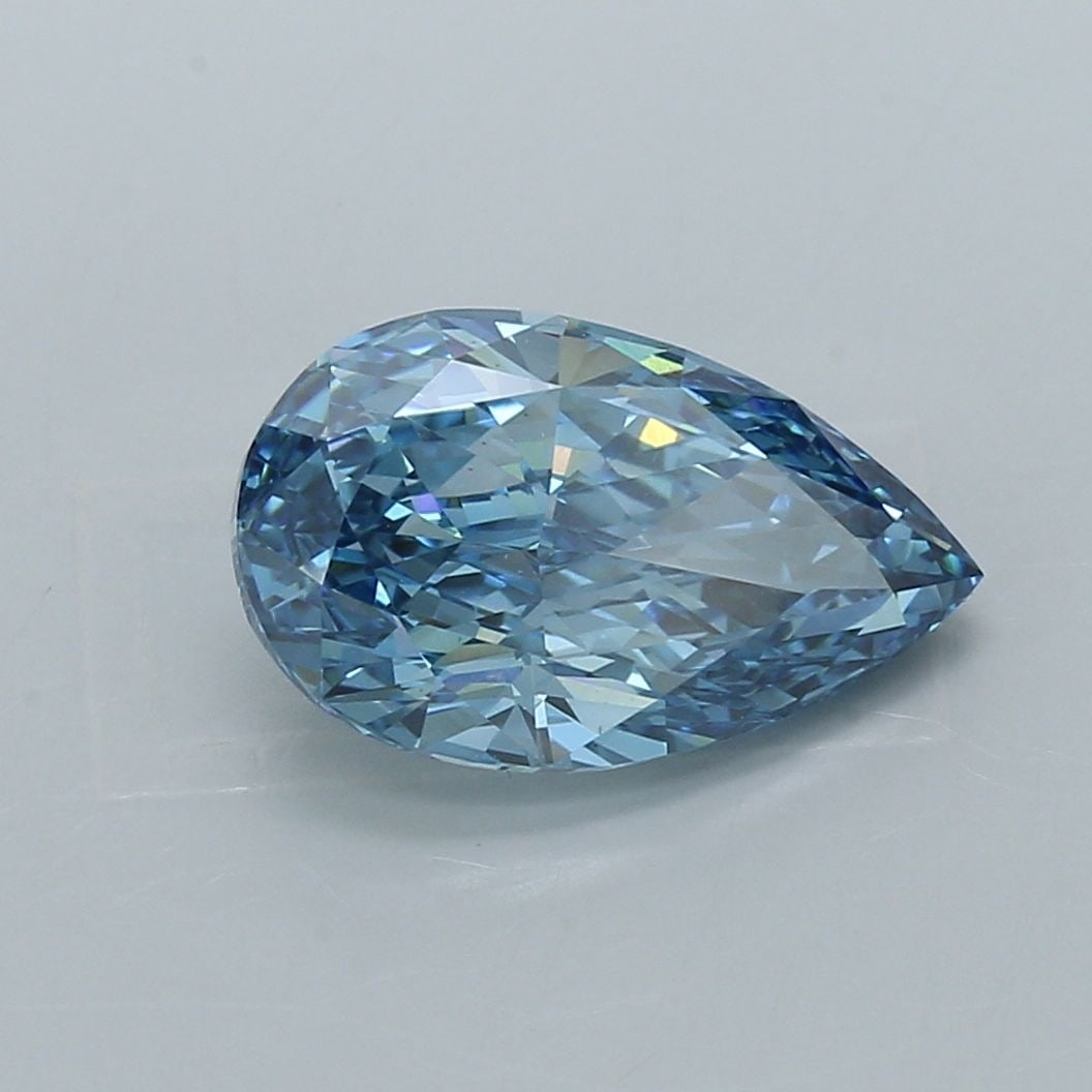 Loose Diamond - PEAR 4.08ct Fancy Vivid Blue VS1: Loose Diamond - PEAR 4.08ct Fancy Vivid Blue VS1 Source: This is a real non-mined Diamond that has been grown in a lab Shape: PEAR Carats: 4.08 Color: Fancy Vivid Blue Certification: IGI Video: