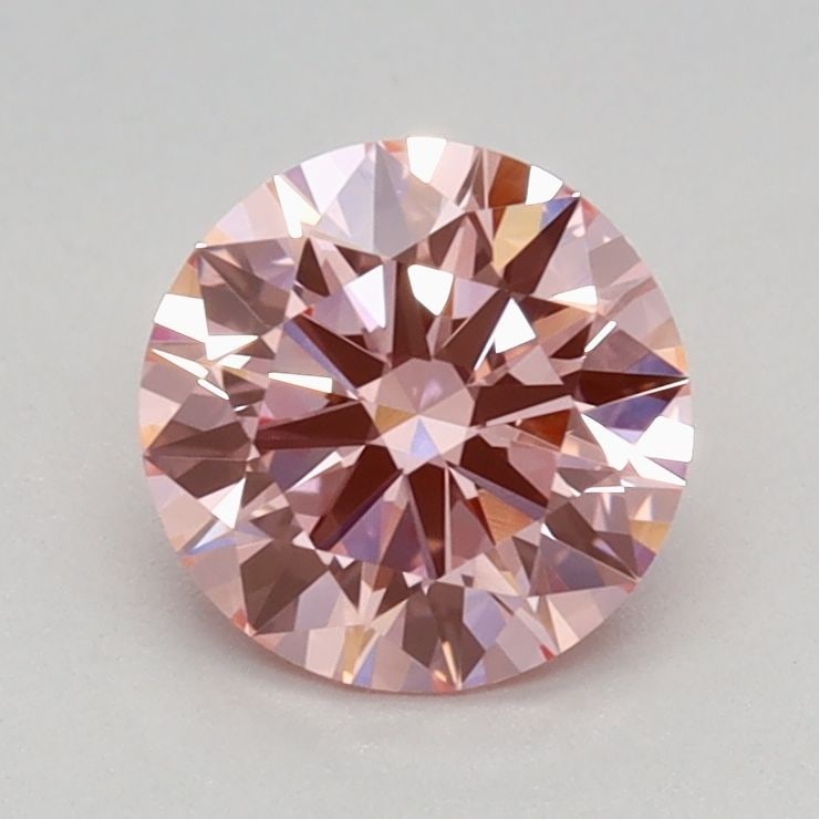 Ideal Loose Diamond - ROUND 0.78ct Fancy Vivid Pink VVS2: Ideal Loose Diamond - ROUND 0.78ct Fancy Vivid Pink VVS2 Source: This is a real non-mined Diamond that has been grown in a lab Shape: ROUND Carats: 0.78 Color: Fancy Vivid Pink Certification: IGI Vide