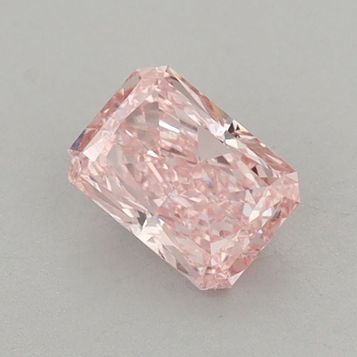 Loose Diamond - RADIANT 0.65ct Fancy Vivid Pink VS2: Loose Diamond - RADIANT 0.65ct Fancy Vivid Pink VS2 Source: This is a real non-mined Diamond that has been grown in a lab Shape: RADIANT Carats: 0.65 Color: Fancy Vivid Pink Certification: IGI Video: