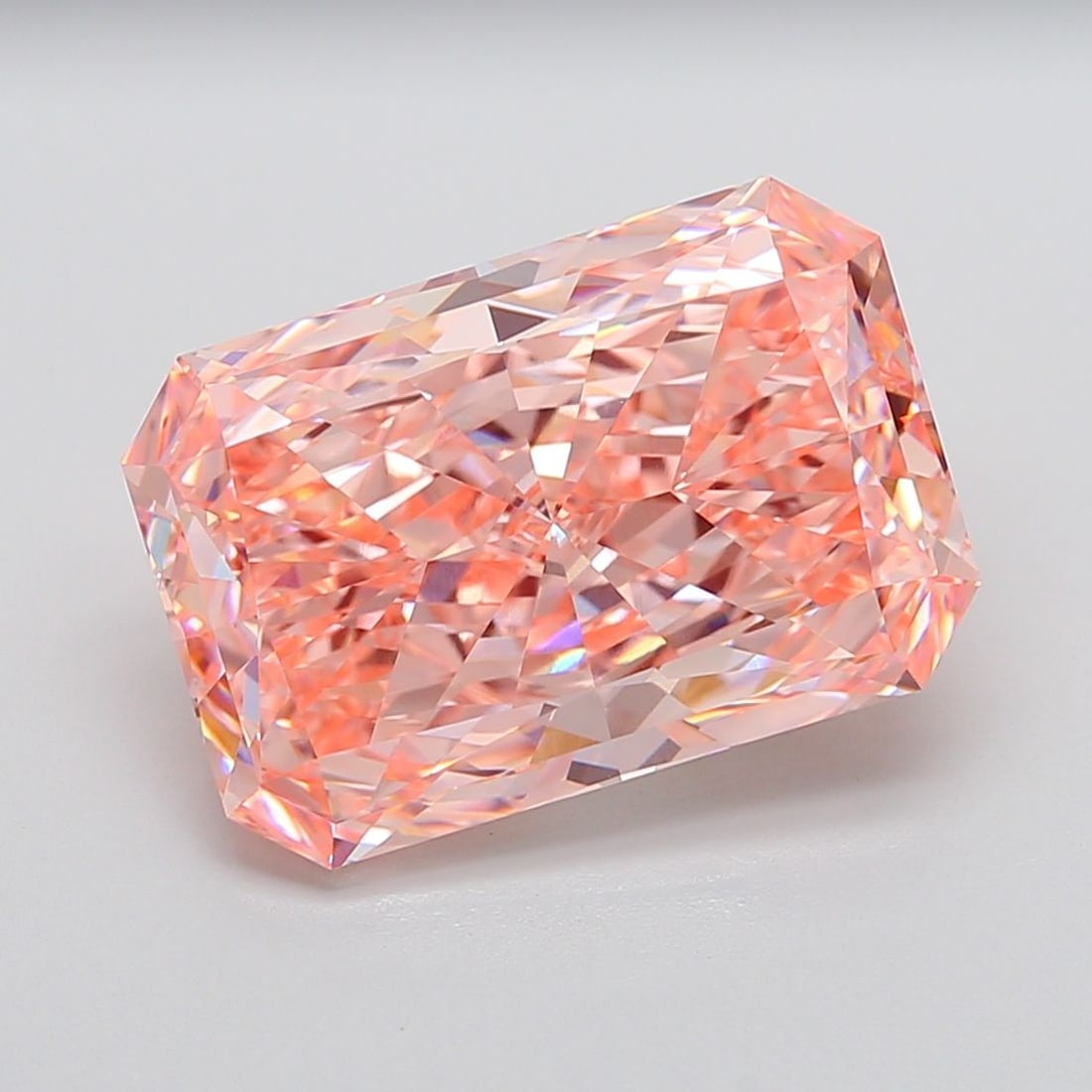 Loose Diamond - RADIANT 13.66ct Fancy Vivid Pink VVS2: Loose Diamond - RADIANT 13.66ct Fancy Vivid Pink VVS2 Source: This is a real non-mined Diamond that has been grown in a lab Shape: RADIANT Carats: 13.66 Color: Fancy Vivid Pink Certification: IGI Addi
