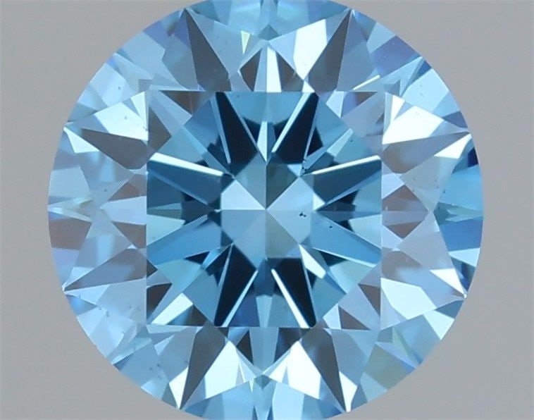 Ideal Loose Diamond - ROUND 0.66ct Fancy Vivid Blue VS2: Ideal Loose Diamond - ROUND 0.66ct Fancy Vivid Blue VS2 Source: This is a real non-mined Diamond that has been grown in a lab Shape: ROUND Carats: 0.66 Color: Fancy Vivid Blue Certification: IGI Video