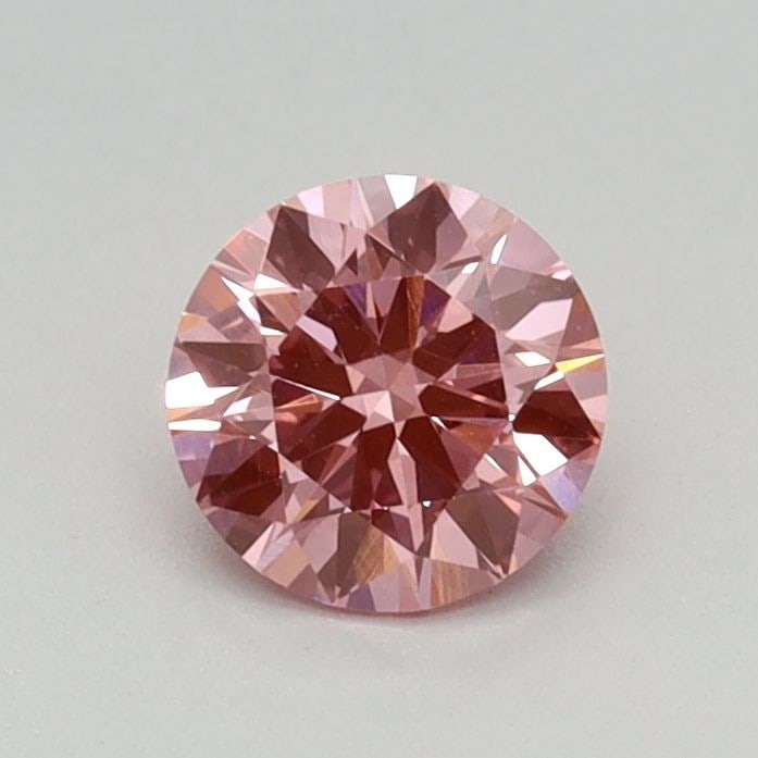 Loose Diamond - ROUND 0.47ct Fancy Vivid Pink VVS2: Loose Diamond - ROUND 0.47ct Fancy Vivid Pink VVS2 Source: This is a real non-mined Diamond that has been grown in a lab Shape: ROUND Carats: 0.47 Color: Fancy Vivid Pink Certification: IGI Video: