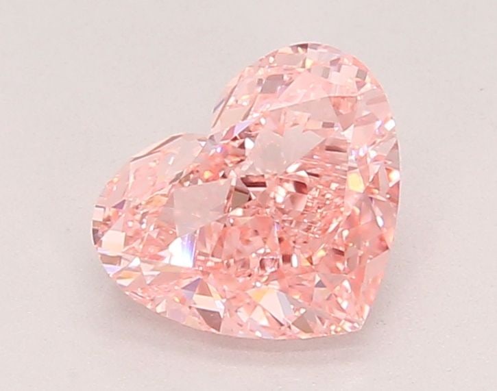 Loose Diamond - HEART 1.45ct Fancy Vivid Pink VVS2: Loose Diamond - HEART 1.45ct Fancy Vivid Pink VVS2 Source: This is a real non-mined Diamond that has been grown in a lab Shape: HEART Carats: 1.45 Color: Fancy Vivid Pink Certification: IGI Video: