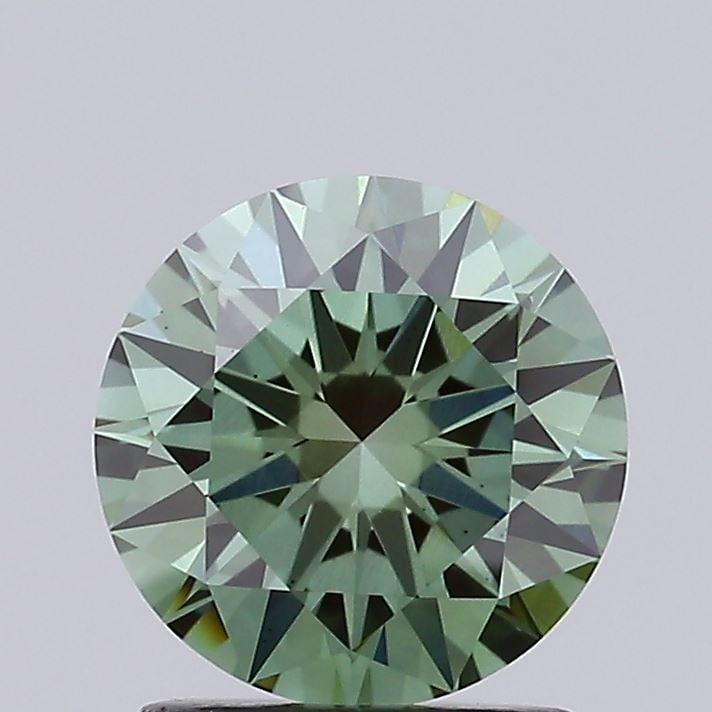 Loose Diamond - ROUND 1.52ct Fancy Vivid Green VS2: Loose Diamond - ROUND 1.52ct Fancy Vivid Green VS2 Source: This is a real non-mined Diamond that has been grown in a lab Shape: ROUND Carats: 1.52 Color: Fancy Vivid Green Certification: IGI Video:
